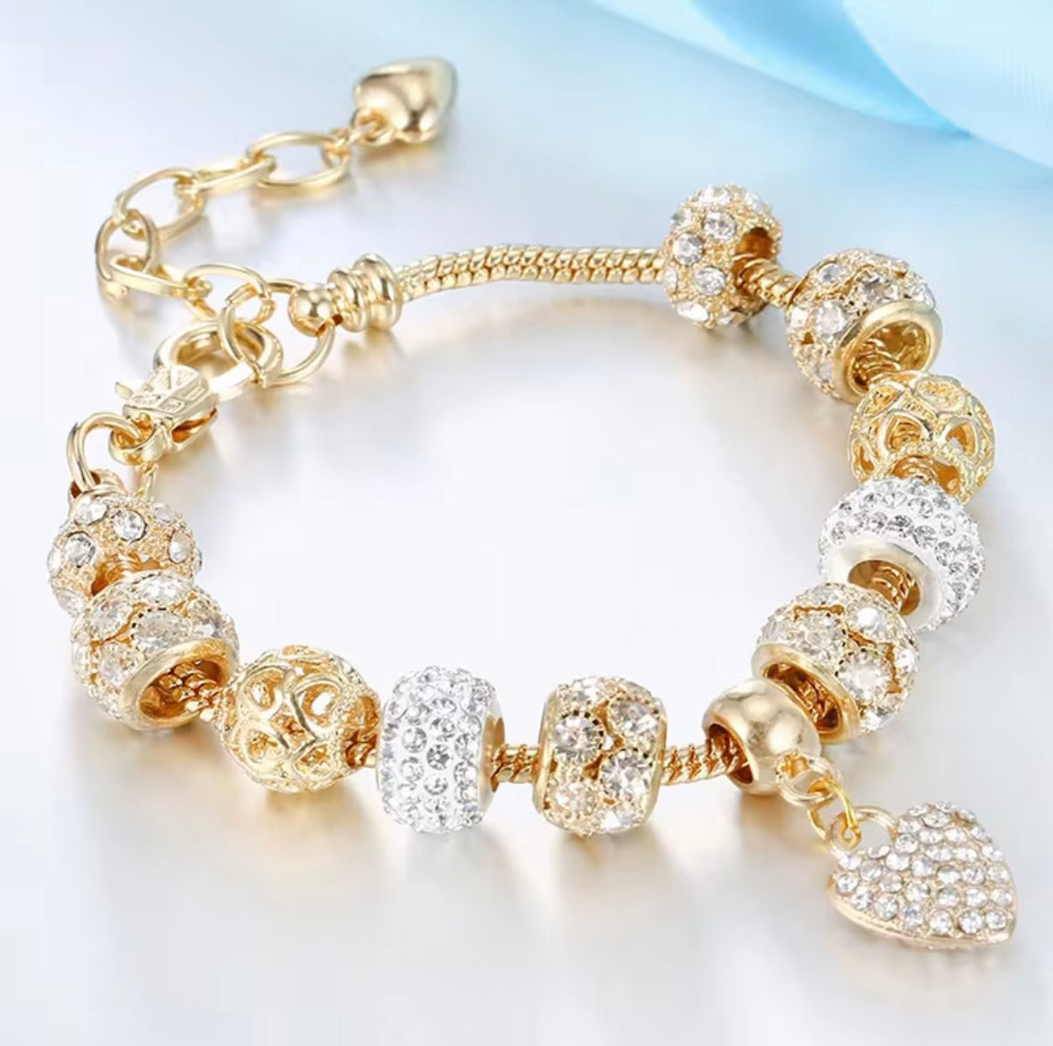 Radiant Gold and Crystal Heart Charm Bracelet