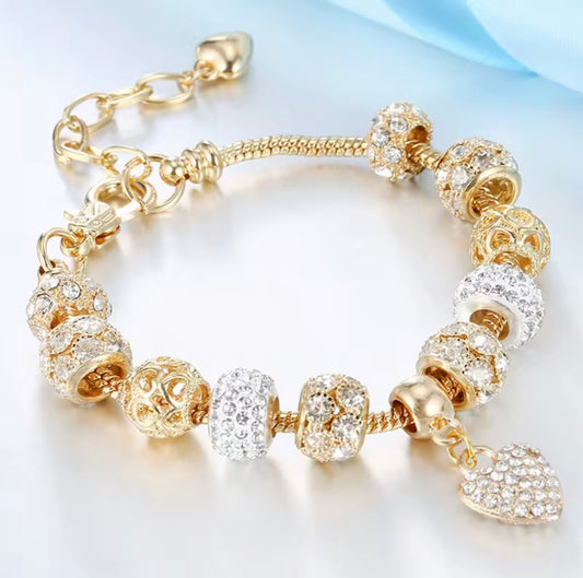 Radiant Gold and Crystal Heart Charm Bracelet